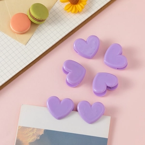 Set of 6 minimalist purple heart-shaped plastic clips for paper and office decor