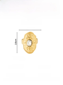Detail showing vintage gold titanium ring size and textured surface with oval zircon