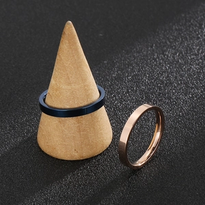 Minimalist 3mm stainless steel rings in black and rose gold with polished mirror finish