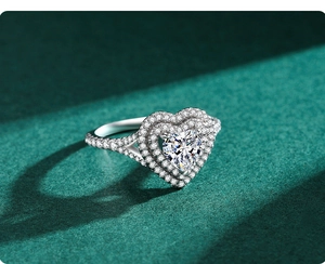 Macro detail of a classic heart-shaped diamond ring with s925 silver and double halo setting