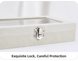 Close-up of elegant silver metal buckle and soft velvet texture on jewelry box lid