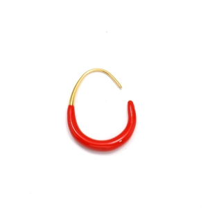 Close-up of elegant U-shaped gold earrings with vibrant red enamel drop details