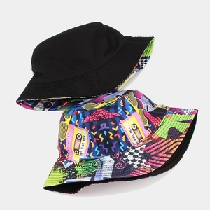 Reversible bucket hat with vintage 80s cassette print and classic black cotton canvas