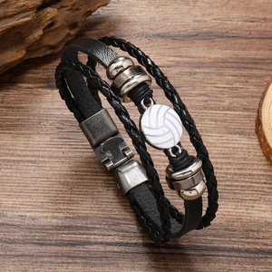 Multilayer black leather woven bracelet with silver beads and a white volleyball charm