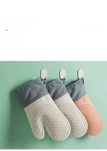 Three heat-resistant silicone oven mitts with anti-slip grip and long fabric wrist guards