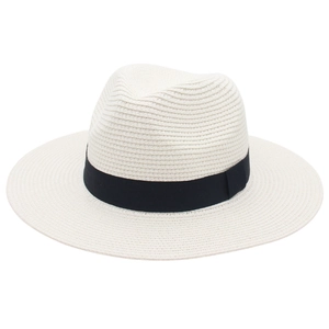 Close-up of Panama straw hat featuring breathable weave and black grosgrain ribbon