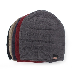 Warm chunky knit beanie hats for winter in multiple colors with square logo patch