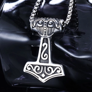 Viking Thor Hammer Mjölnir necklace in stainless steel with intricate rune patterns