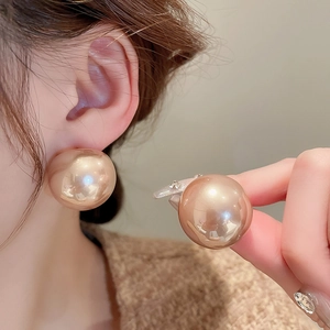 Orecchini a sfera geometrici color oro champagne con finitura lucida per donna