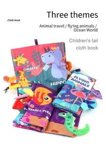Detailed view of colorful baby cloth books featuring textured animal tails and sensory pages
