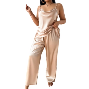 Women silk satin pajama set with camisole top and wide leg pants in champagne gold color