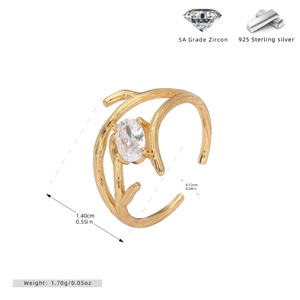 Macro detail of S925 silver organic gold-plated branch ring with 5A cubic zirconia