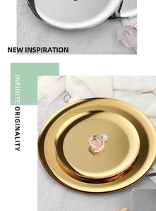 Detailed view of round metal trays in gold and silver finish with polished mirror surface