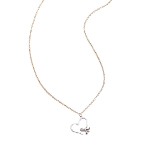 Minimalist stainless steel heart necklace featuring scissor and comb pendant for women