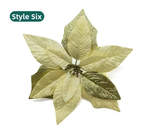 Détail de la fleur de Poinsettia artificielle champagne doré avec paillettes décoratives