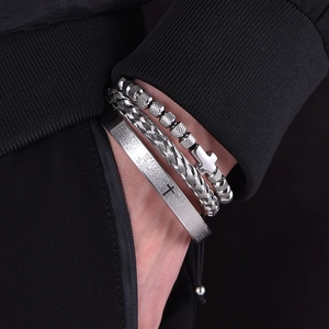 Three-piece set of men's stainless steel bracelets featuring a twisted cuff and cross beads