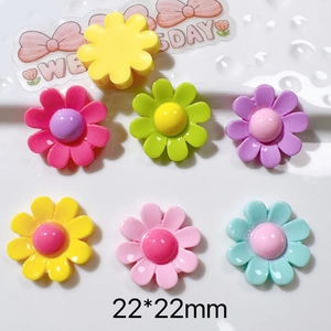 Macro shot of 22mm colorful flower resin DIY charms for phone cases and hair accessories