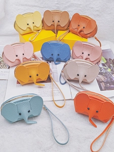 Colorful elephant-shaped leather coin purses with wrist straps and zipper closure