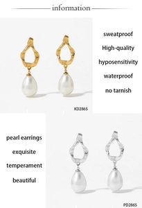 Detail of gold and silver textured hoop earrings with pear-shaped pearl pendants