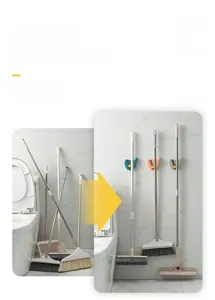 Detail of wall-mounted mop holder showing before and after comparison on marble wall