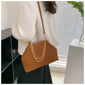 Close-up of brown pleated cloud bag with elegant gold chain and refined PU leather texture