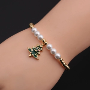 Detail of Christmas tree charm bracelet with white pearls and colorful rhinestones