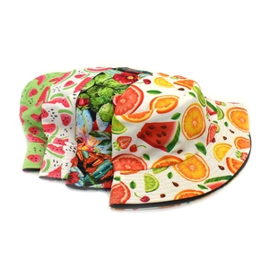 Reversible bucket hats for men and women with vibrant fruit and cactus prints