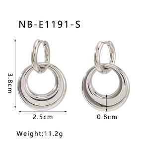 Detail view of double-hoop detachable earrings in polished silver-tone stainless steel