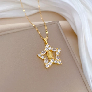 Elegant gold titanium steel necklace with star pendant and inlaid crystals on jewelry box