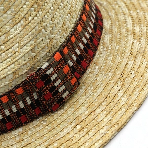Classic straw sun hat with ethnic geometric ribbon band for summer beach vacations