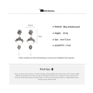 Detailed product specifications for vintage flower drop earrings with pearl pendants