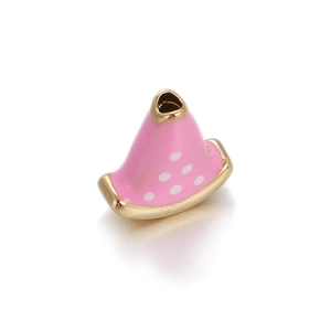 Detailed view of a pink enamel witch hat charm with white dots and gold metal trim
