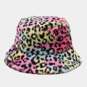 Close-up of soft faux fur texture on a colorful rainbow leopard print bucket hat