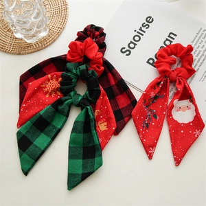 Set of three Christmas holiday hair scrunchies with Santa and plaid patterns