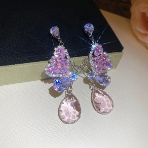 Vintage style butterfly earrings with pink and purple rhinestones and teardrop pendant