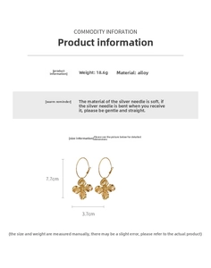 Detail of gold metal flower earrings with silver needle post and precise measurements