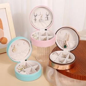 Portable round PU leather jewelry box for rings and necklaces in pink and mint green