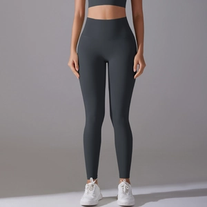 Close-up of high-waist charcoal grey yoga leggings with seamless design and elastic fabric