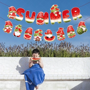 Watermelon summer banner with gnome designs hanging under a blue sky for party decor