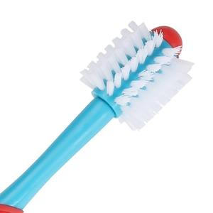 Dual-head pet toothbrush with blue handle and soft white bristles for dog dental care