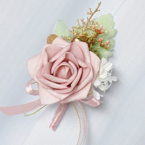Dusty pink PE rose boutonniere with gold-edged ribbons for wedding groom and guests