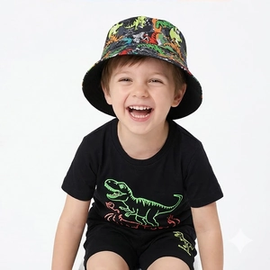 Detail of kids black cotton T-shirt and bucket hat set featuring green dinosaur prints