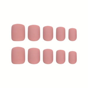 Solid matte dusty pink short square press-on nails set displayed on white background