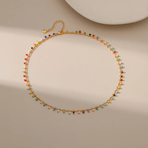 Detailed shot of 18K gold plated necklace with colorful small beads and lobster clasp