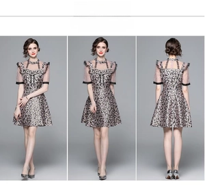 Three-angle view of a vintage floral jacquard dress with lace collar and sheer pink mesh
