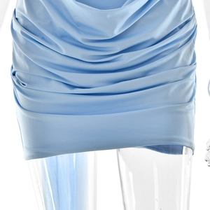 Detailed view of the blue ruched texture and smooth mesh fabric on bodycon dress
