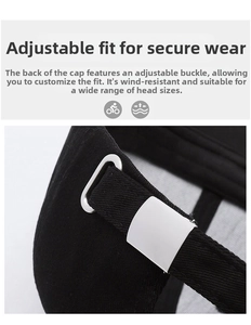 Detail of adjustable metal buckle and strap on the black cotton baseball cap