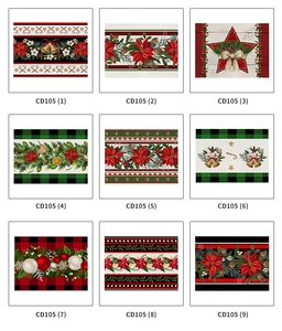 Collection of nine Christmas linen placemats with festive patterns and holiday motifs