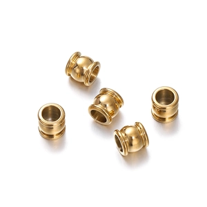 Detailed view of gold stainless steel spacer beads for DIY jewelry and bracelet making