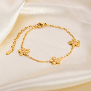 18K gold plated stainless steel bracelet featuring elegant five-petal flower charms